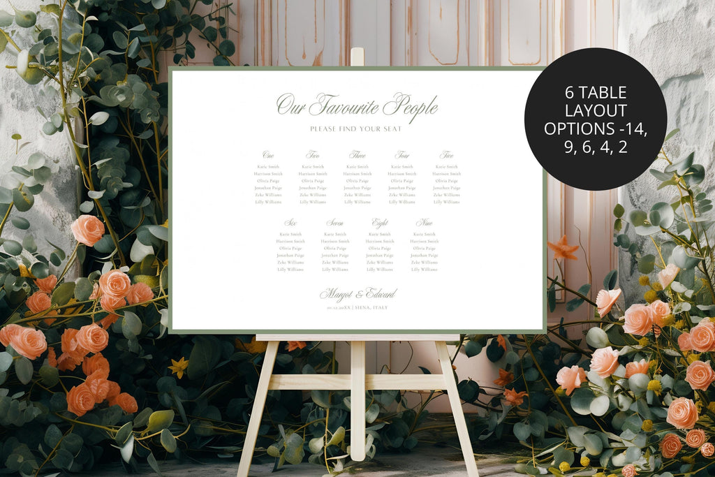 Editable wedding seating chart template with a sage green border shown on an easel among lush greenery and peach wedding flowers.