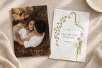 Botanical photo save the date template displayed front and back on neutral linen, pairing a couple’s photograph with an elegant wedding announcement framed by green foliage and burgundy floral details.