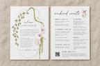 Botanical wedding ceremony program template with a curved green floral border and burgundy flowers, displayed front and back on linen with wedding party details, order of events and a photo sharing QR code.