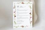 Editable floral wedding bar menu template with drinks listed beneath “the bar” heading, framed by delicate pink flowers and green foliage for elegant reception drinks signage.
