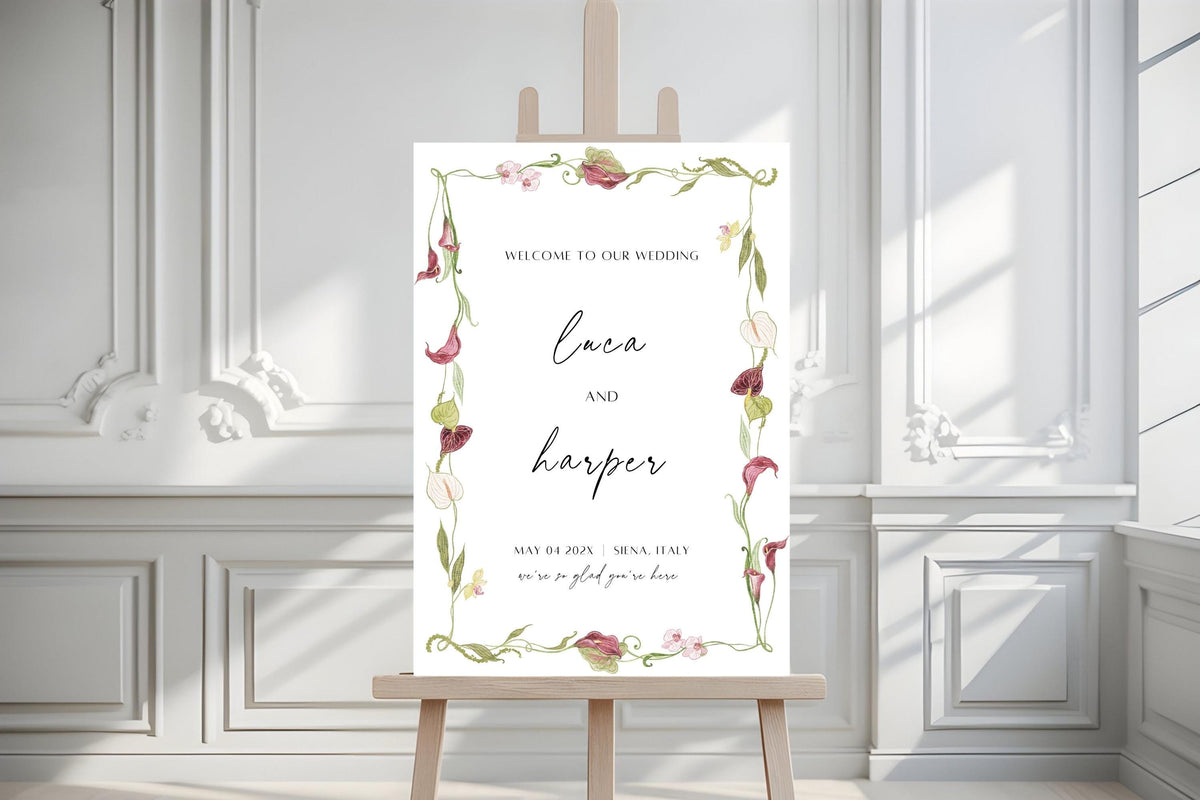 Elegant floral wedding welcome sign template displayed on easel, printable botanical ceremony entrance sign with burgundy orchids, greenery and modern calligraphy