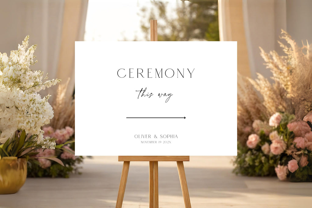 Editable wedding ceremony sign template in Canva displayed on easel, modern wedding ceremony entrance sign, minimalist wedding signage printable, elegant black and white wedding decor, DIY wedding sign instant download.