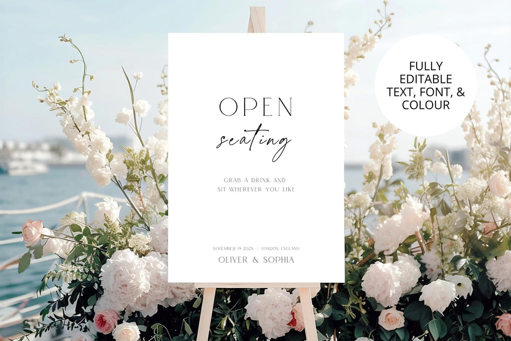 Open seating wedding sign template displayed in coastal wedding setting, editable wedding reception sign, modern minimalist black and white wedding decor, printable A1 open seating sign, elegant reception seating signage, instant download Canva wedding template.