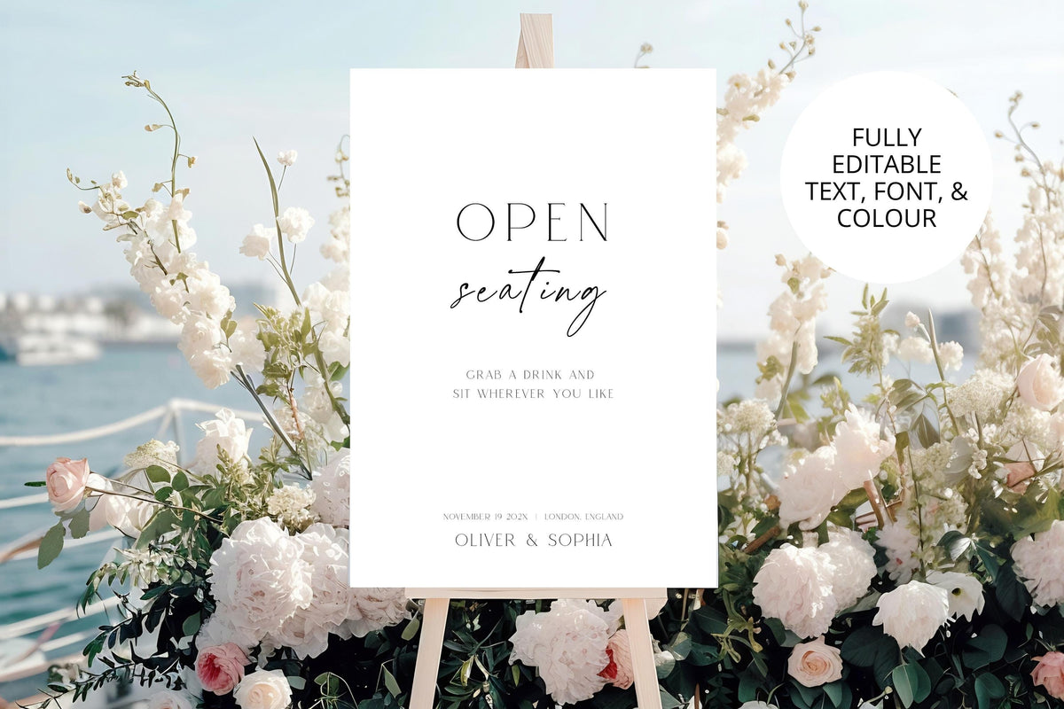 Open seating wedding sign template displayed in coastal wedding setting, editable wedding reception sign, modern minimalist black and white wedding decor, printable A1 open seating sign, elegant reception seating signage, instant download Canva wedding template.