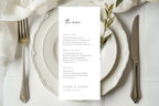 minimalist wedding menu template 4x9 inch, elegant neutral place setting with white plate and linen napkin, editable canva wedding menu card, modern serif wedding stationery