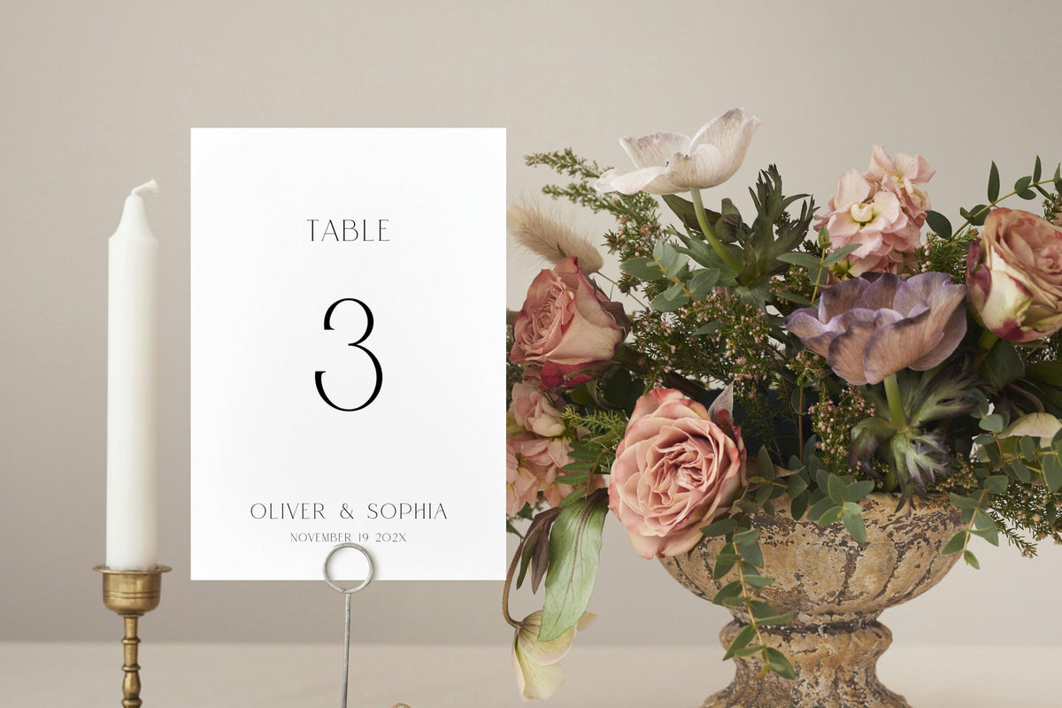 Minimalist wedding table number sign printable, elegant serif table number 3, neutral wedding decor, blush floral centerpiece styling, editable Canva template table numbers