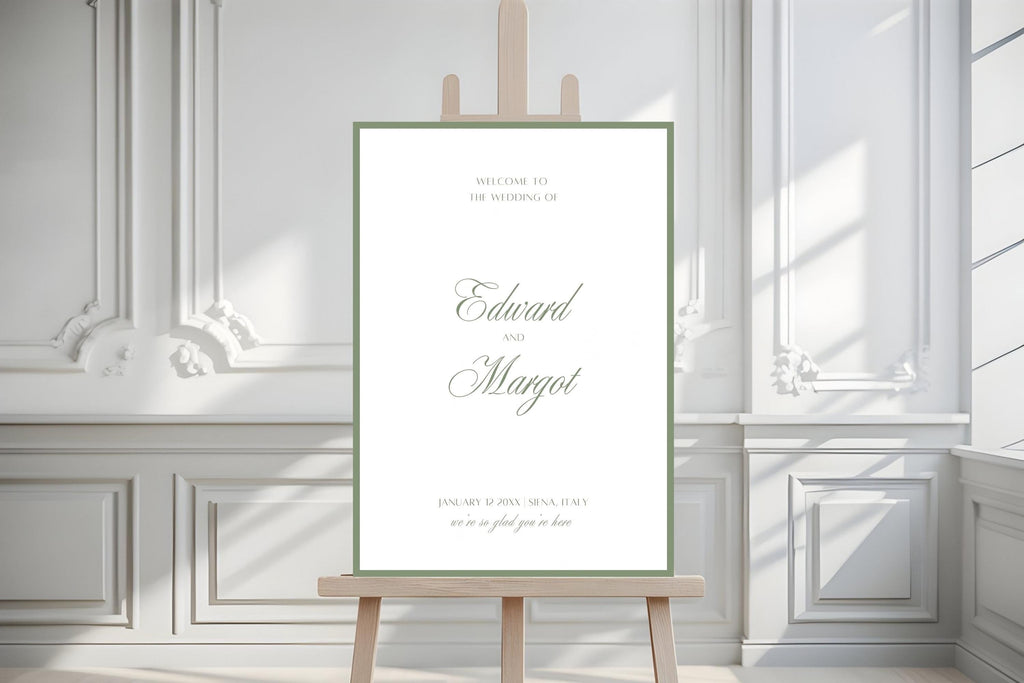 Classic wedding welcome sign with sage green script and a slim border, displayed on a wooden easel in a white panelled room. Elegant personalised wedding entrance signage styled for a timeless manor house celebration.
