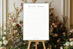 First Dance Sweepstake sign with a sage green border, styled on an easel among garden flowers and greenery for an outdoor wedding.