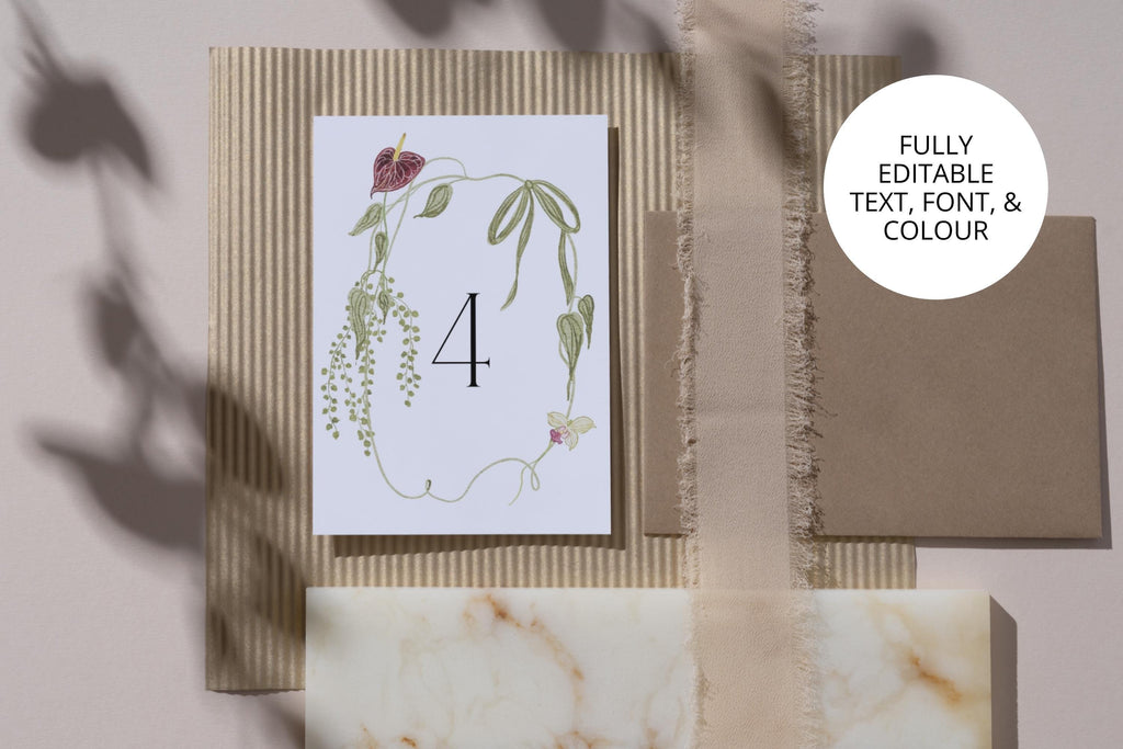 Editable floral table number Canva template featuring hand-drawn botanical details, with fully customisable text, font and colours.