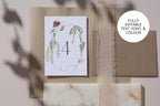Editable floral table number Canva template featuring hand-drawn botanical details, with fully customisable text, font and colours.