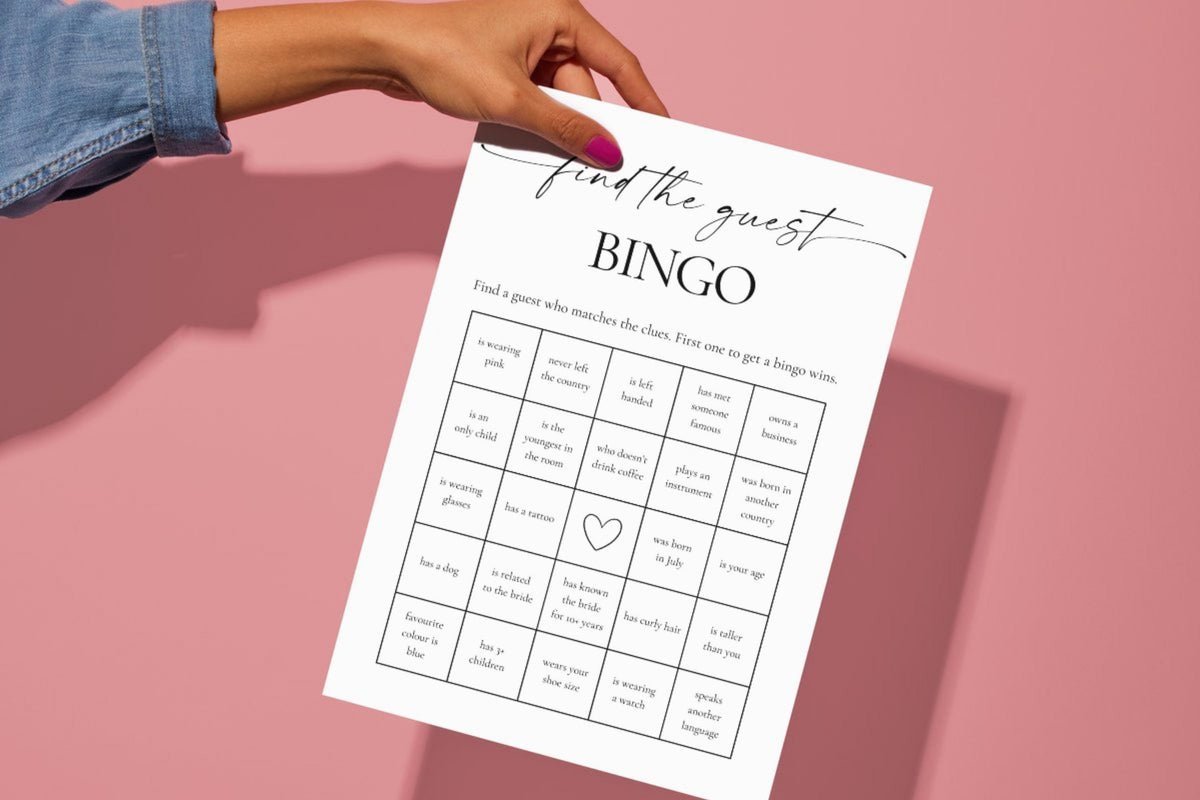 Playful pink background with find the guest wedding bingo card - modern editable Canva bridal game for hens night or welcome party