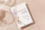 Flatlay of mimosa bar sign with wildflower border, printable bridal shower and wedding bar signage, editable Canva template for brunch or garden party