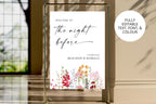 Editable rehearsal dinner welcome sign shown in a bright window setting, featuring colourful flowers and a note about customising the text, font and colour.