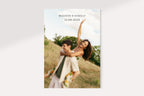 Portrait view of an editable wedding save the date card featuring a romantic couple photograph and minimalist text on a soft ivory background.
