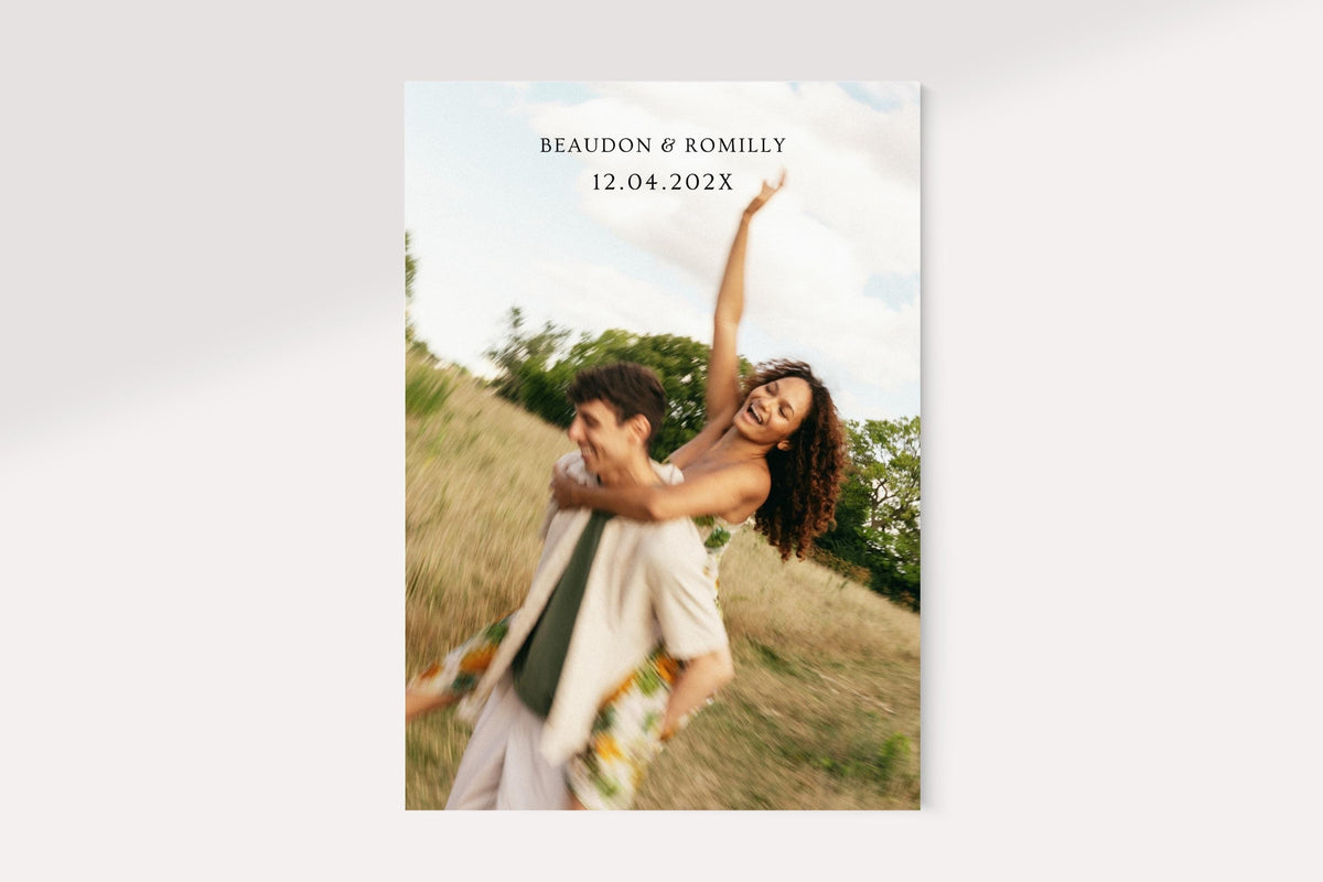 Portrait view of an editable wedding save the date card featuring a romantic couple photograph and minimalist text on a soft ivory background.