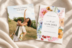Two editable wedding save the date cards displayed on ivory linen, featuring a romantic couple photo card and a colourful floral design with an oval centre.