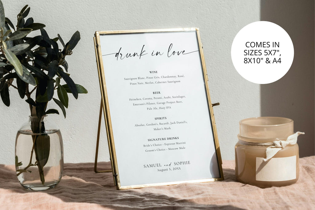 Editable minimalist wedding thank you sign in gold frame with candle and plant styling, modern neutral wedding signage Canva template, printable reception table sign