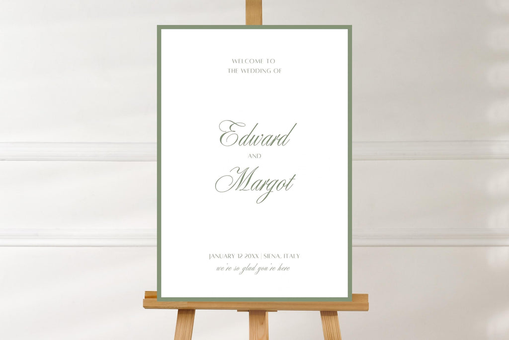 Minimalist sage green wedding welcome sign on a wooden easel against a neutral background. White portrait design with a delicate green border and elegant script names, ideal for classic romantic wedding entrance signage.