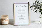 Modern minimalist thank you wedding sign in gold frame with candle styling, clean neutral wedding décor, editable Canva printable wedding signage template