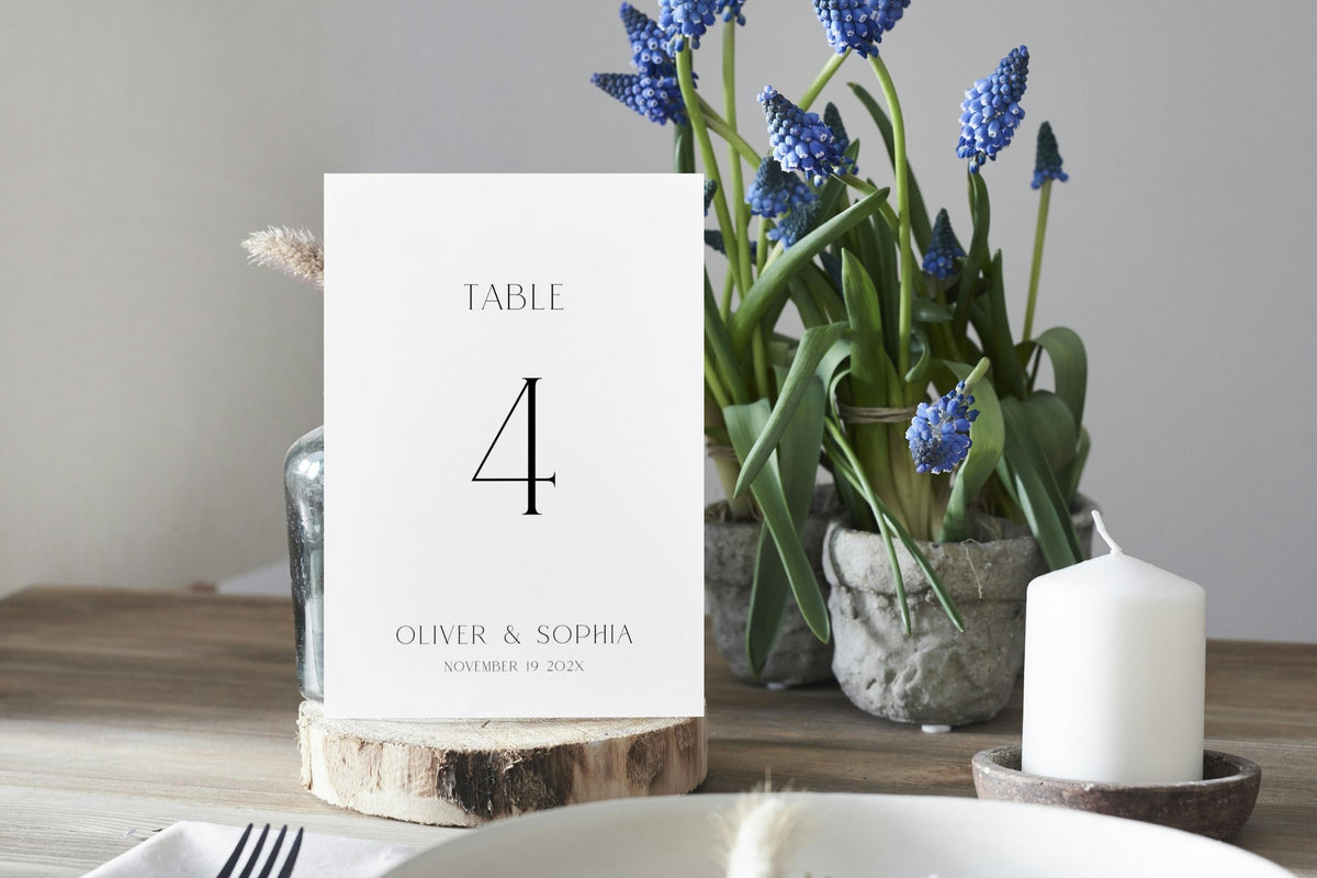 Modern wedding table number printable, table 4 sign with blue florals, minimalist wedding signage, editable Canva table numbers template, simple elegant reception decor