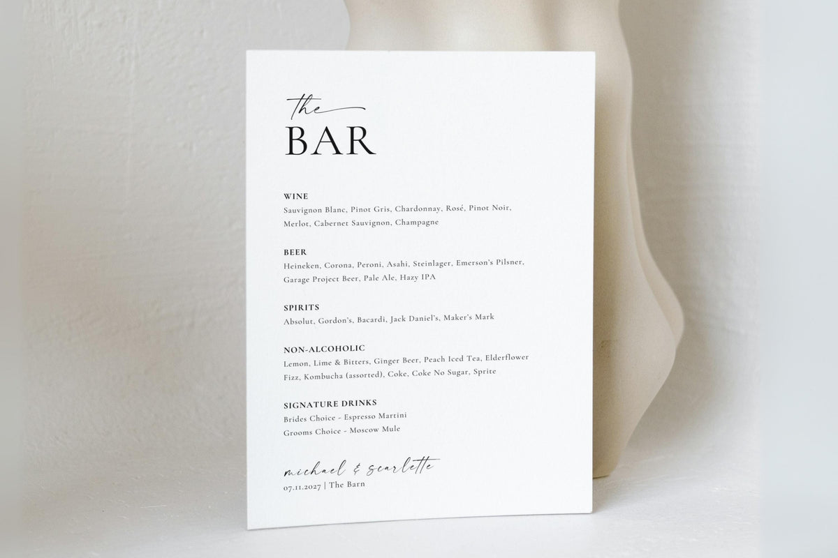 Minimalist wedding bar menu sign with white background and soft drape, printable Canva template for wine, beer, and signature drinks