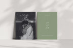 Minimalist sage green wedding save the date template shown front and back, with monochrome couple photography and white script date, displayed upright in natural light with soft shadows.