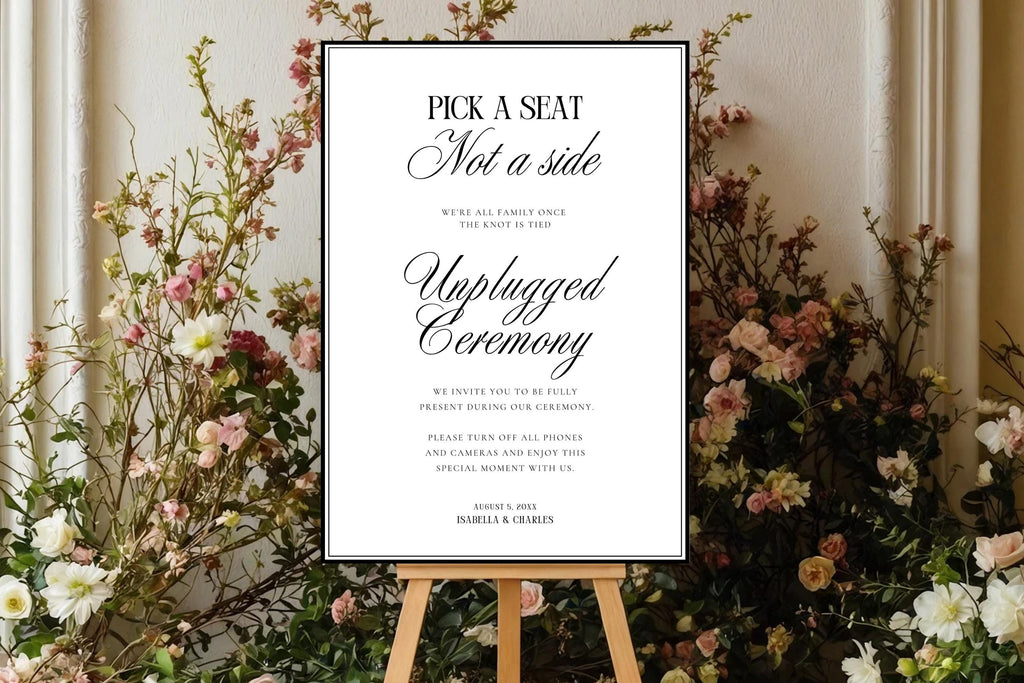 Printable unplugged ceremony sign template displayed on easel with luxury floral wedding backdrop, editable Canva wedding sign, classic black and white ceremony decor, instant download wedding printable