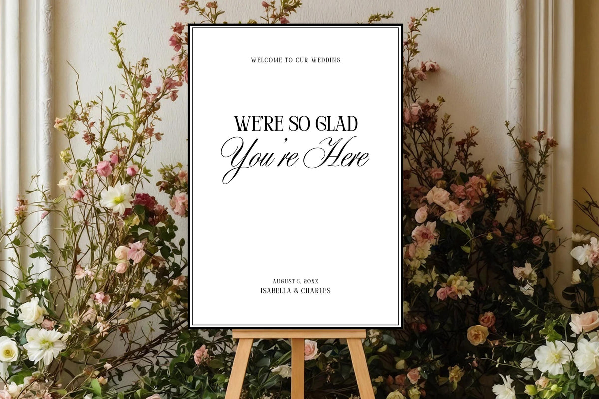 Editable wedding welcome sign template surrounded by romantic garden flowers, minimalist wedding entrance sign, printable Canva welcome poster, elegant black and white wedding decor, modern wedding ceremony sign, editable wedding signage template.