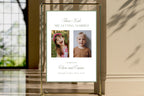 Sage green personalised wedding photo sign displayed in a glass and gold frame, “These Kids Are Getting Married” keepsake sign mockup in a modern wedding venue.