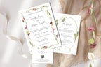 Pink and green botanical wedding stationery suite styled with white ribbon and trailing flowers, featuring a floral border invitation, matching details card and QR code RSVP for a romantic spring or summer wedding.