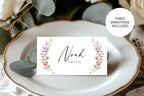 Printable wedding place cards with wildflower design, customizable name cards in Canva, folded escort cards for rustic boho floral weddings