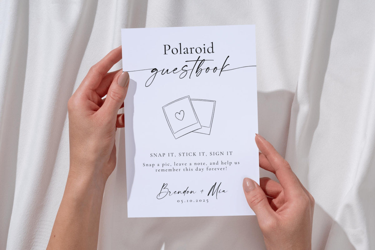 Polaroid photo guestbook sign template held in hands - minimalist editable Canva template for weddings, printable in 5x7, 8x10 and A4 sizes for modern guestbook displays.