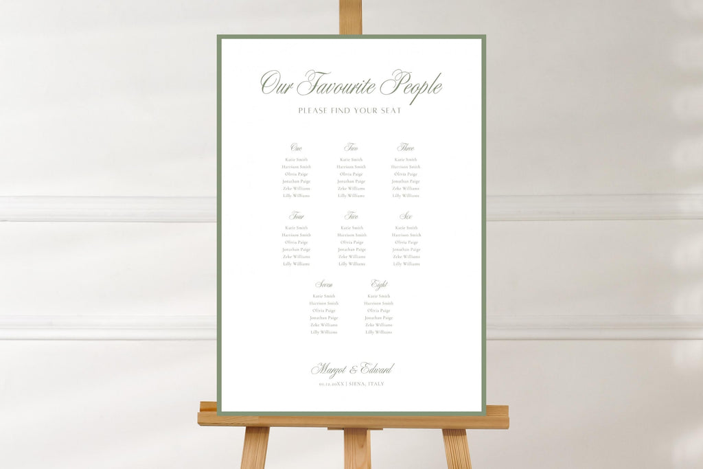 Classic wedding seating chart with sage green outline and Our Favourite People script heading, shown on a wooden easel against a white wall. Minimalist printable reception seating plan for an elegant old money wedding.