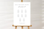 Simple minimalist wedding seating chart template on easel, clean white modern seating plan sign, editable Canva wedding seating chart printable, timeless classic wedding signage