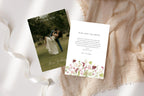 Floral wedding thank you card template with a romantic couple photo front and white thank you message reverse, styled with flowing ivory ribbon and beige fabric. Personalised wedding guest appreciation cards.