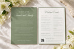 Sage green wedding welcome letter and weekend itinerary template with elegant script lettering, displayed beside white flowers on textured ivory fabric for an old money destination wedding.