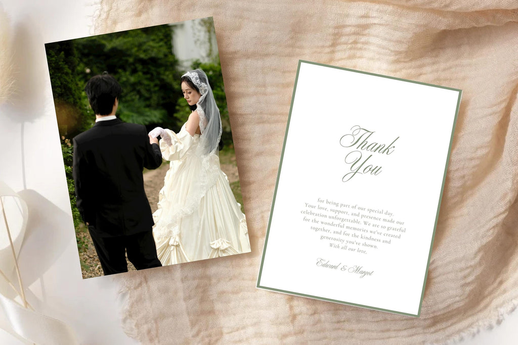 Sage green wedding thank you card template with elegant script, a fine border and personalised appreciation message, paired with a wedding photo reverse on textured beige fabric in natural light.