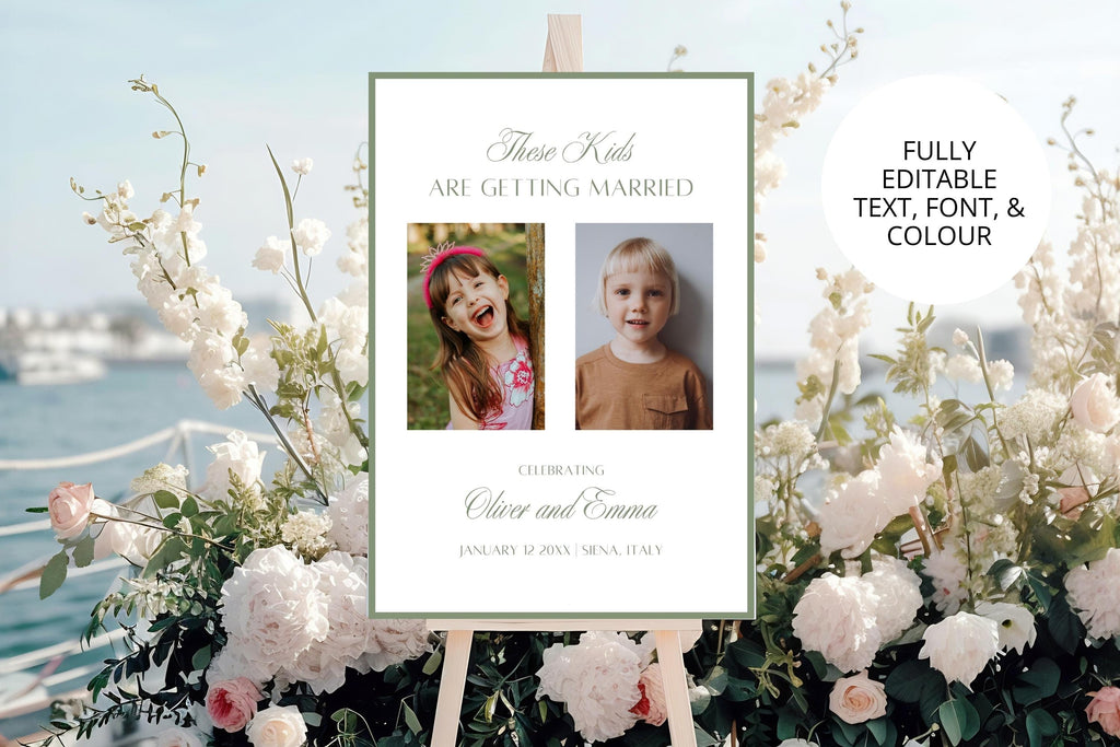 Personalised sage green wedding sign with two photos displayed among white flowers beside the sea, editable “These Kids Are Getting Married” design with custom text, font and colour.