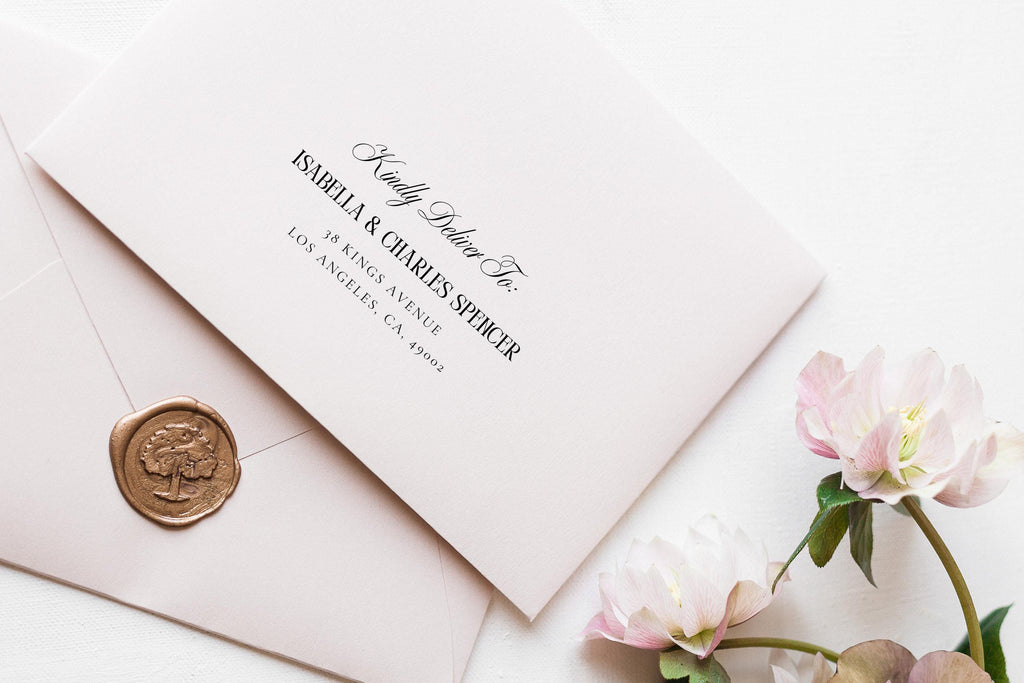 Close-up of wedding envelope addressing template with elegant script and serif fonts, blush envelopes, wax seal, old money wedding stationery design editable in Canva.