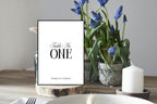 Wedding table number printable in black and white displayed in rustic wood slice setting, editable Canva table number sign for modern minimalist wedding décor and reception styling.