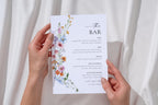 Printable wedding bar menu sign held in hands, minimalist wildflower Canva template, modern editable bar drinks sign for rustic or boho wedding