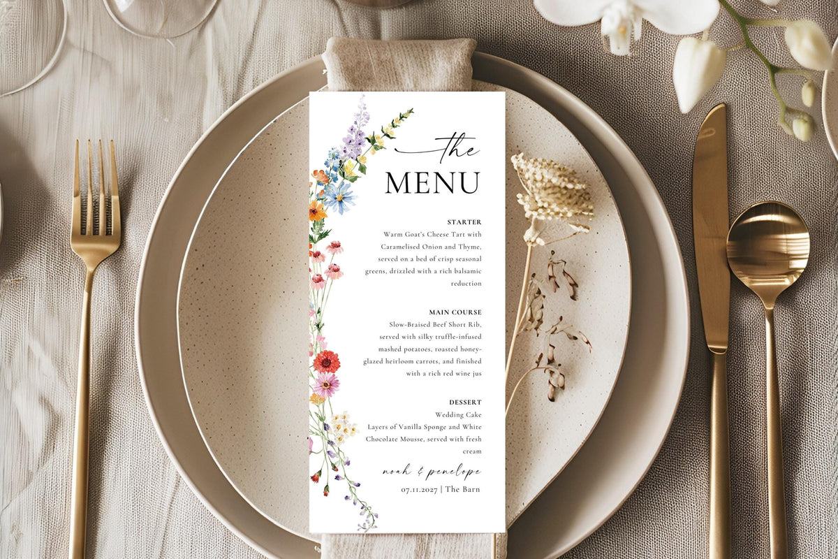 Printable wildflower wedding menu card on rustic beige place setting with gold cutlery, boho floral Canva dinner menu template for reception
