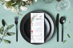 Printable wildflower wedding menu card on sage green table with black cutlery, boho floral reception dinner menu editable Canva template