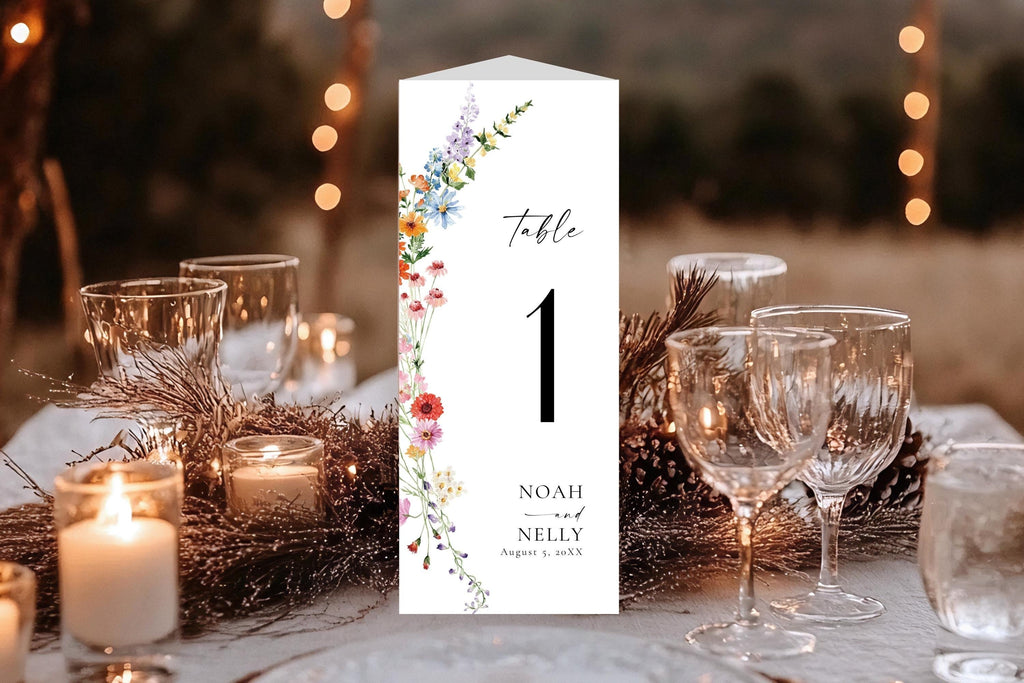 Wildflower wedding trifold table number card with floral design, editable Canva template for menu and bar sign, printable DIY wedding stationery on rustic reception table